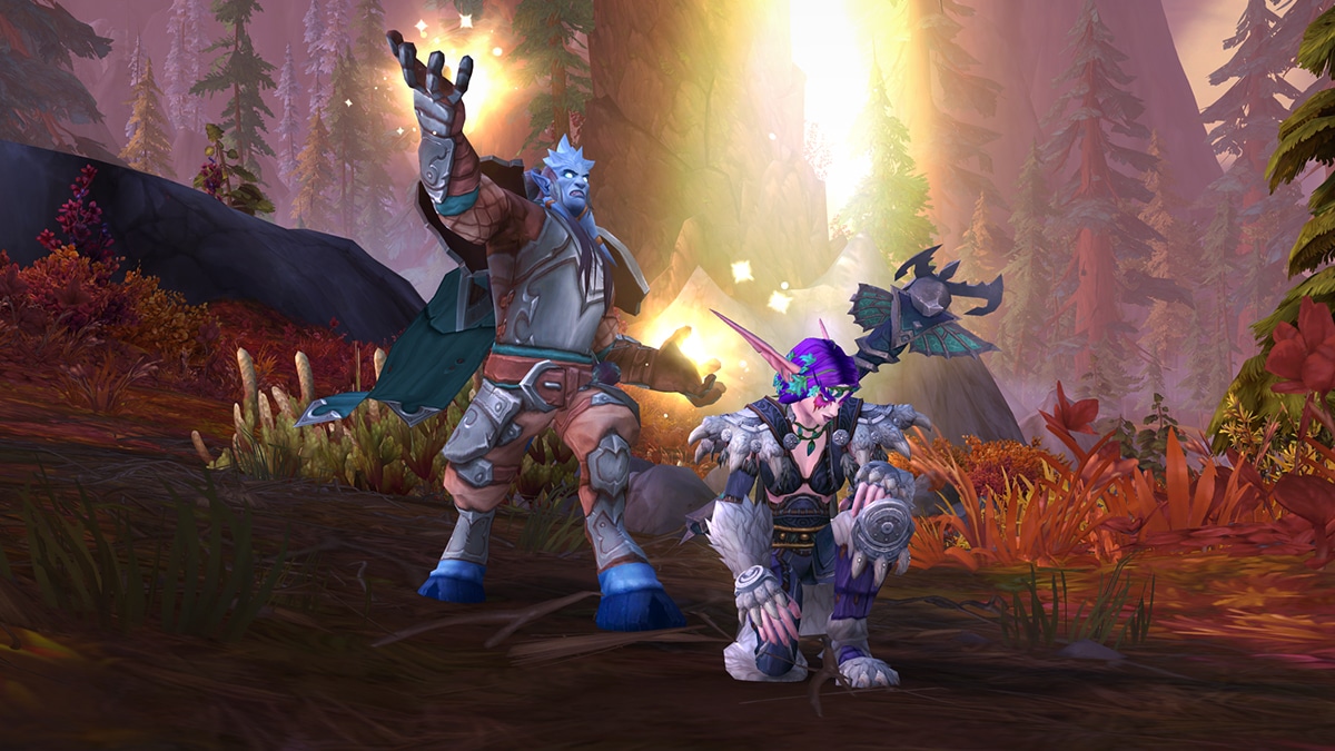 Male Draenei Casting next to a Kneeling Female Night Elf