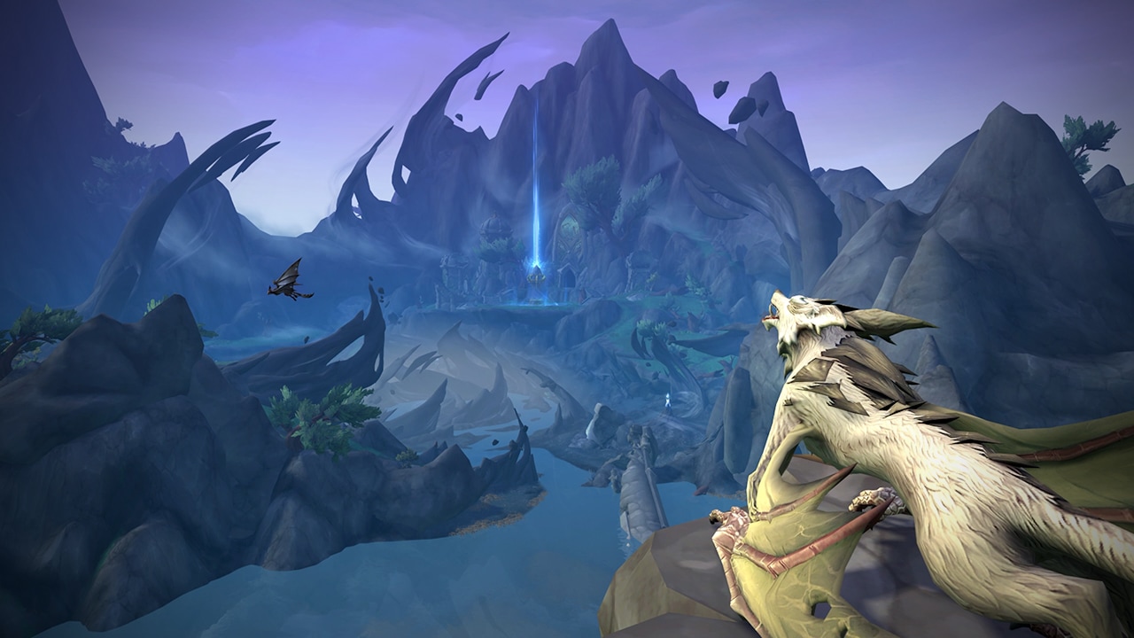View of one of the larger islands in the Forbidden Reach with Craggy Mountains surrounding a point of interest in the zone with a beam of blue light shooting up from a structure.