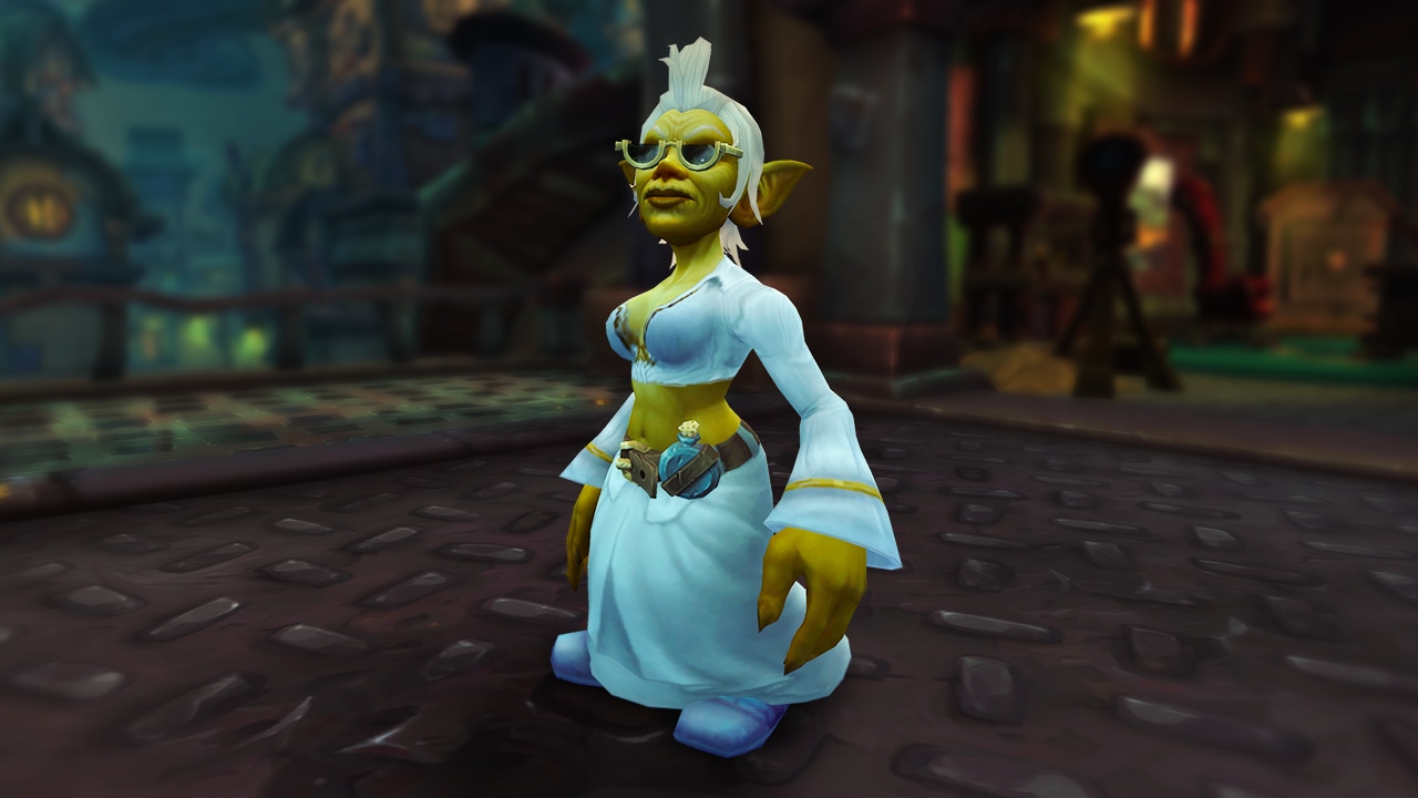 An older yellow skinned female goblin with white hair