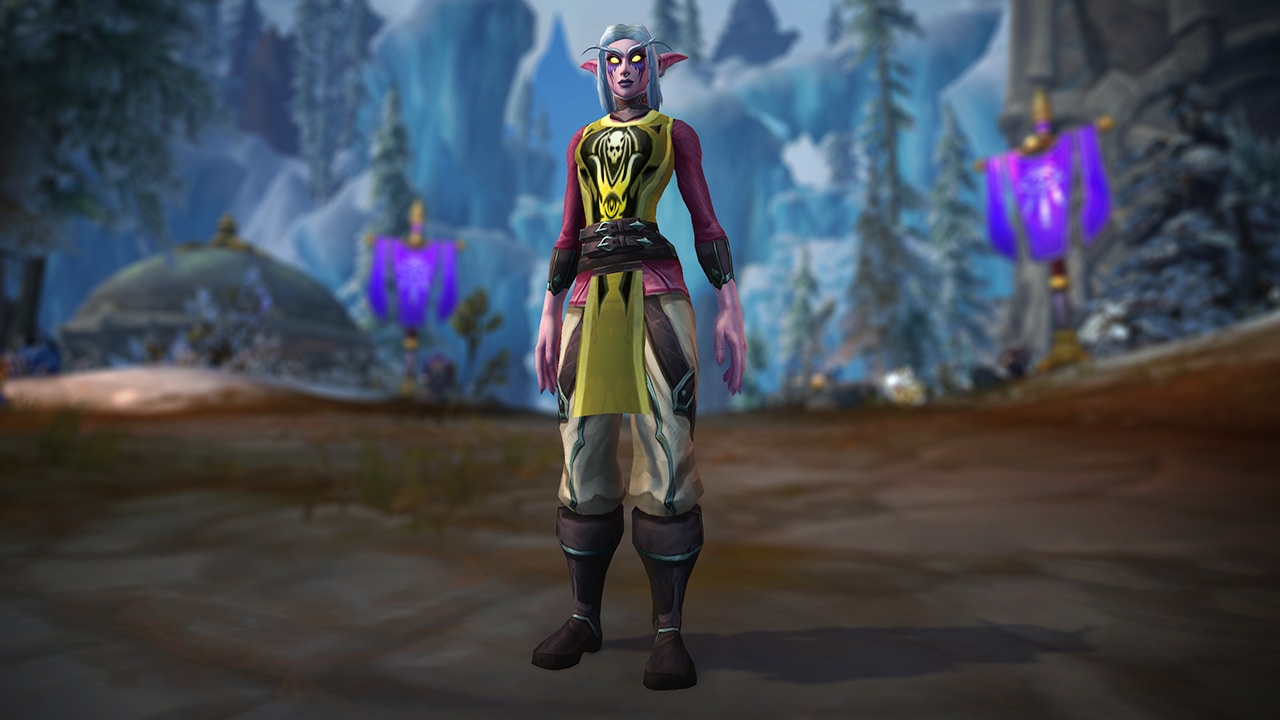 A Night elf stands on a hard-packed dirt road wearing the Tabard of Fury.