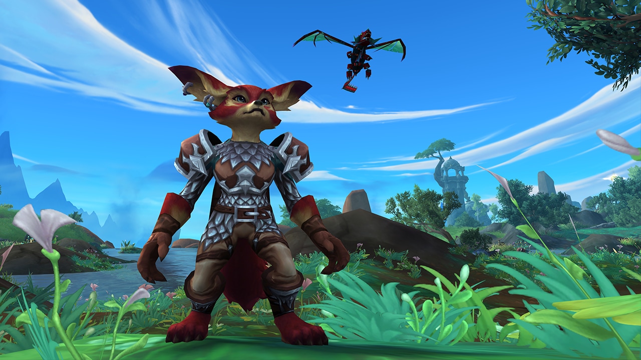 A Vulpera clad in mail armor stands with the Dragon Kite pet floating above.