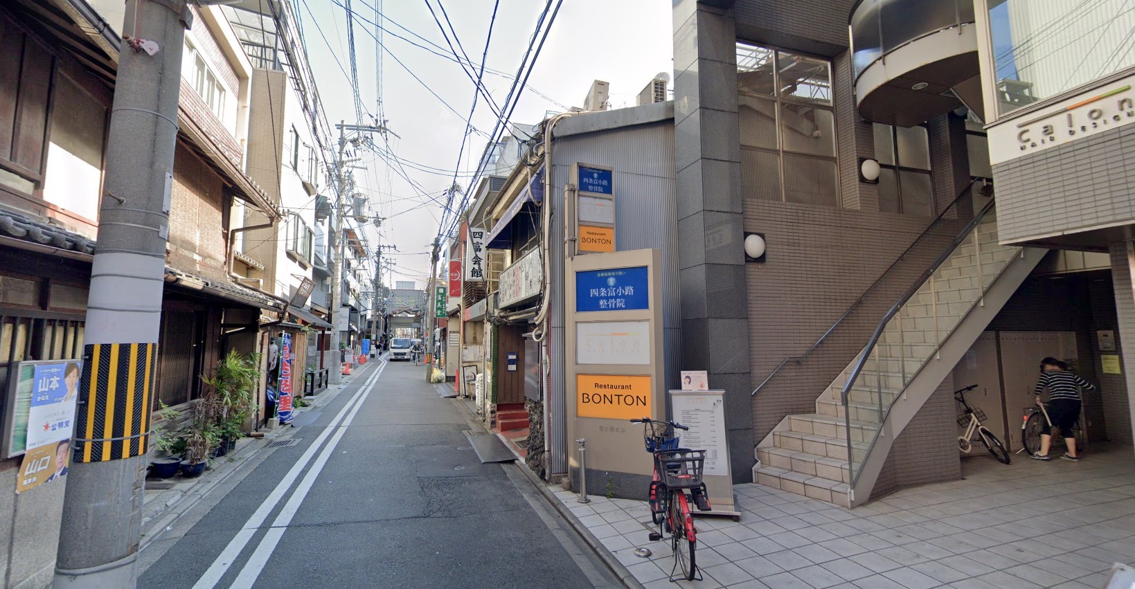 Photograph of a modern Japanese city street.
